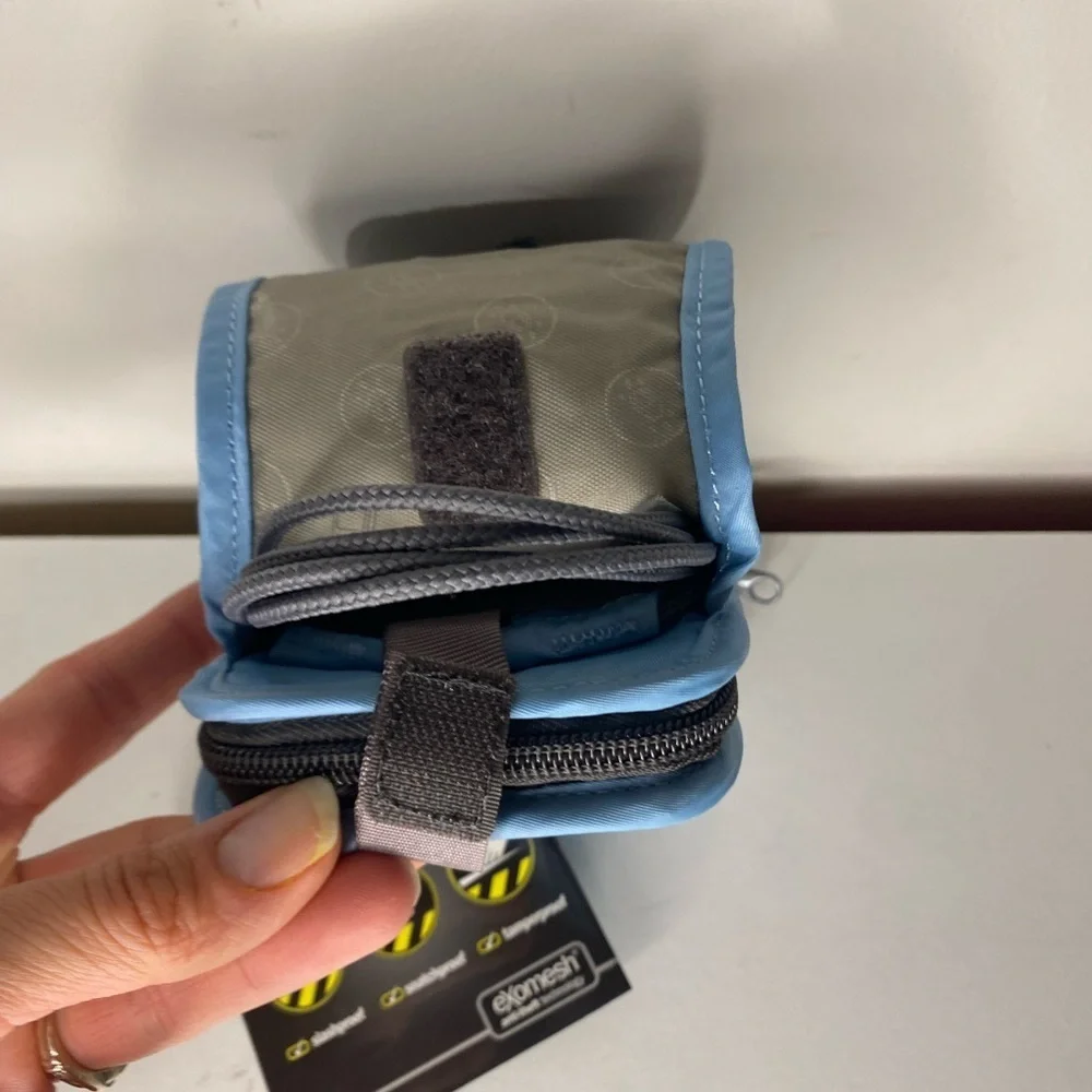 NEW Pacsafe Light Blue Travel Pouch‎ Vacation Wallet